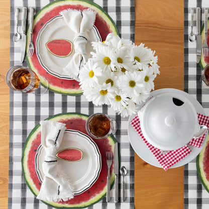 The Die-cut Watermelon Placemat under an elegant summertime table setting for four, from above.