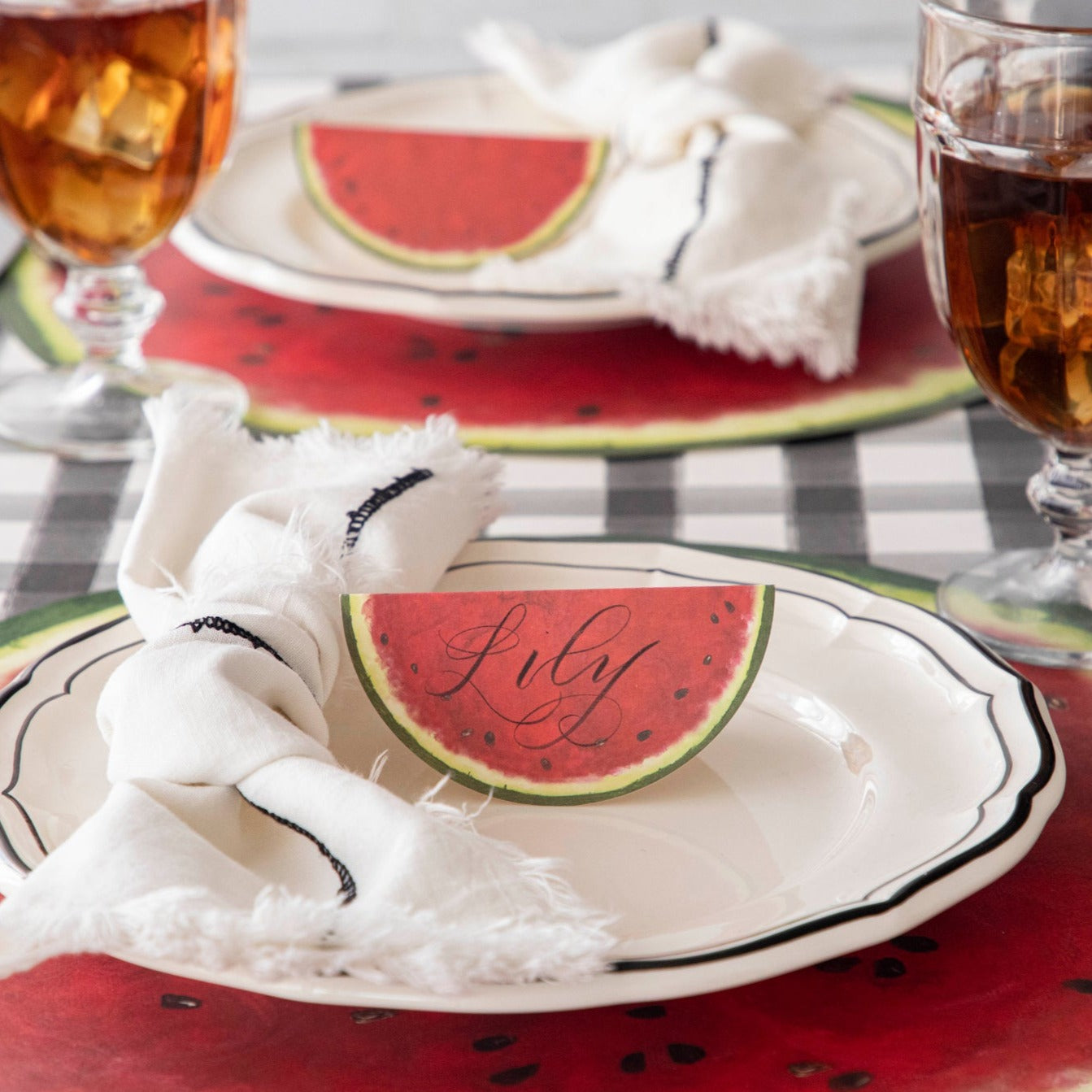 The Die-cut Watermelon Placemat under an elegant table setting.