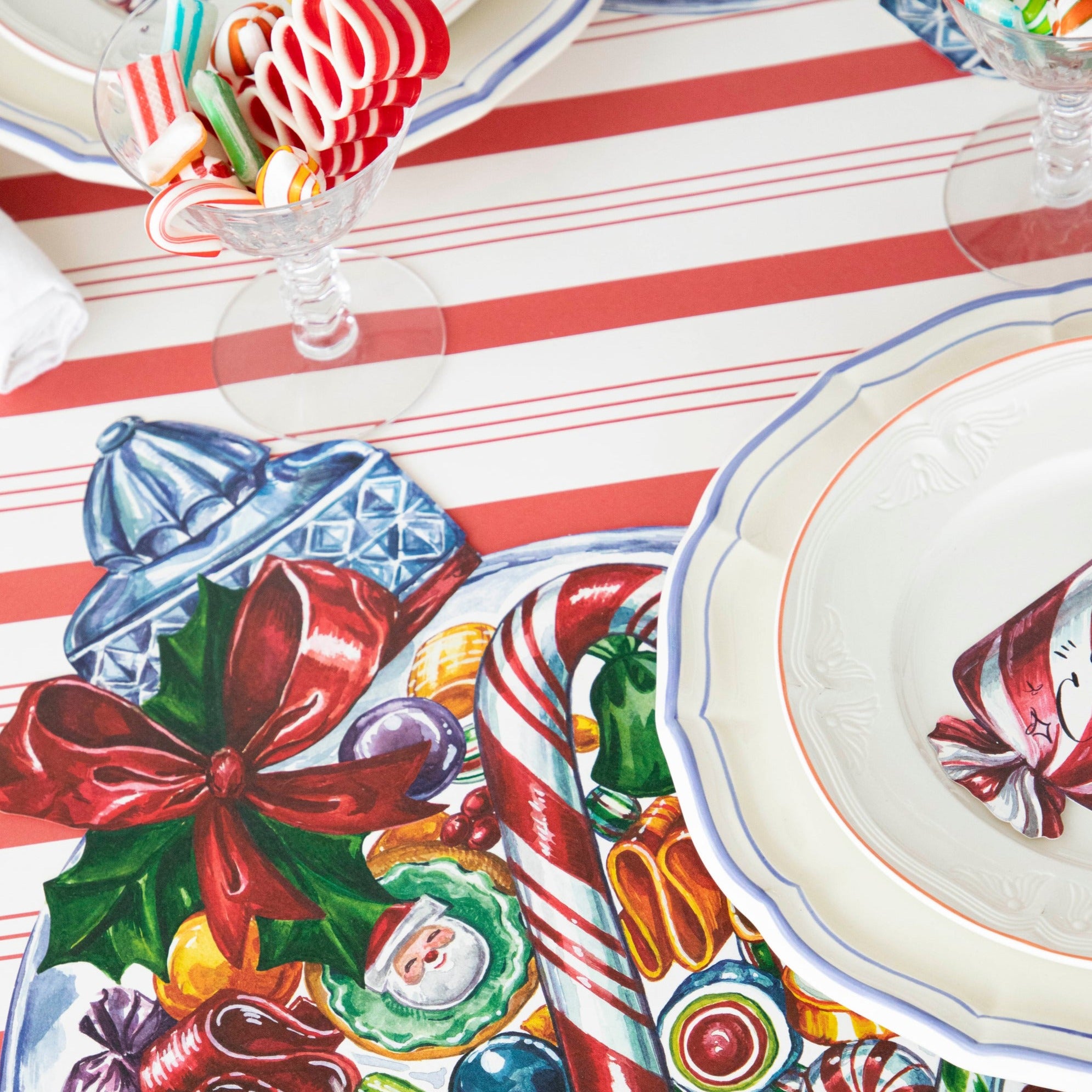 Close up of the Die-cut Candy Jar Placemat in a place setting, showing the candy artwork.