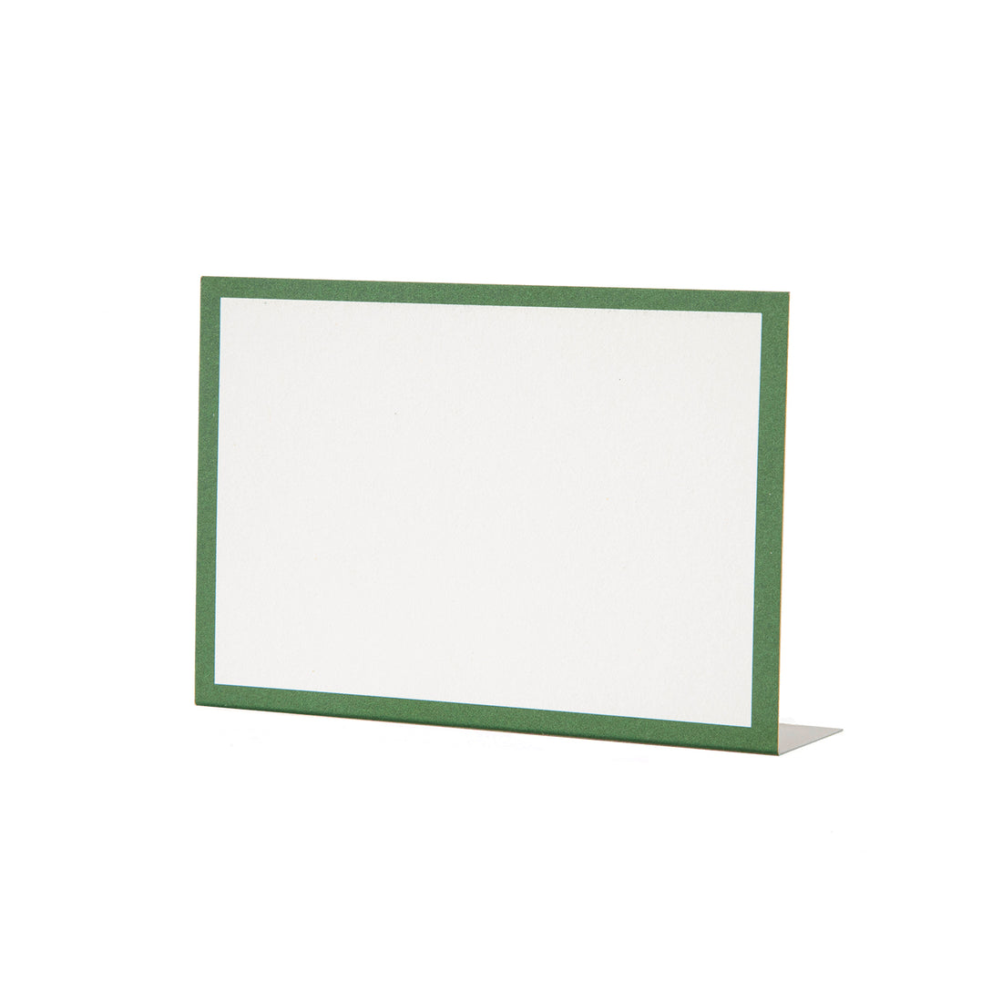 A free-standing, rectangular white table card with a simple dark green frame around the edges.