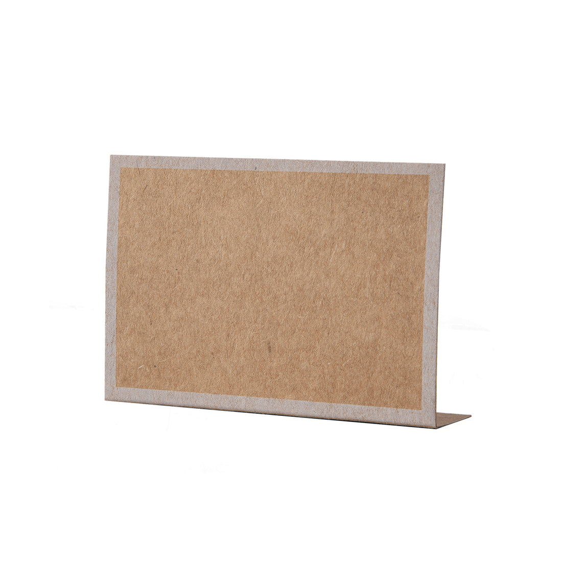 A free-standing, rectangular kraft table card with a simple white frame around the edges.