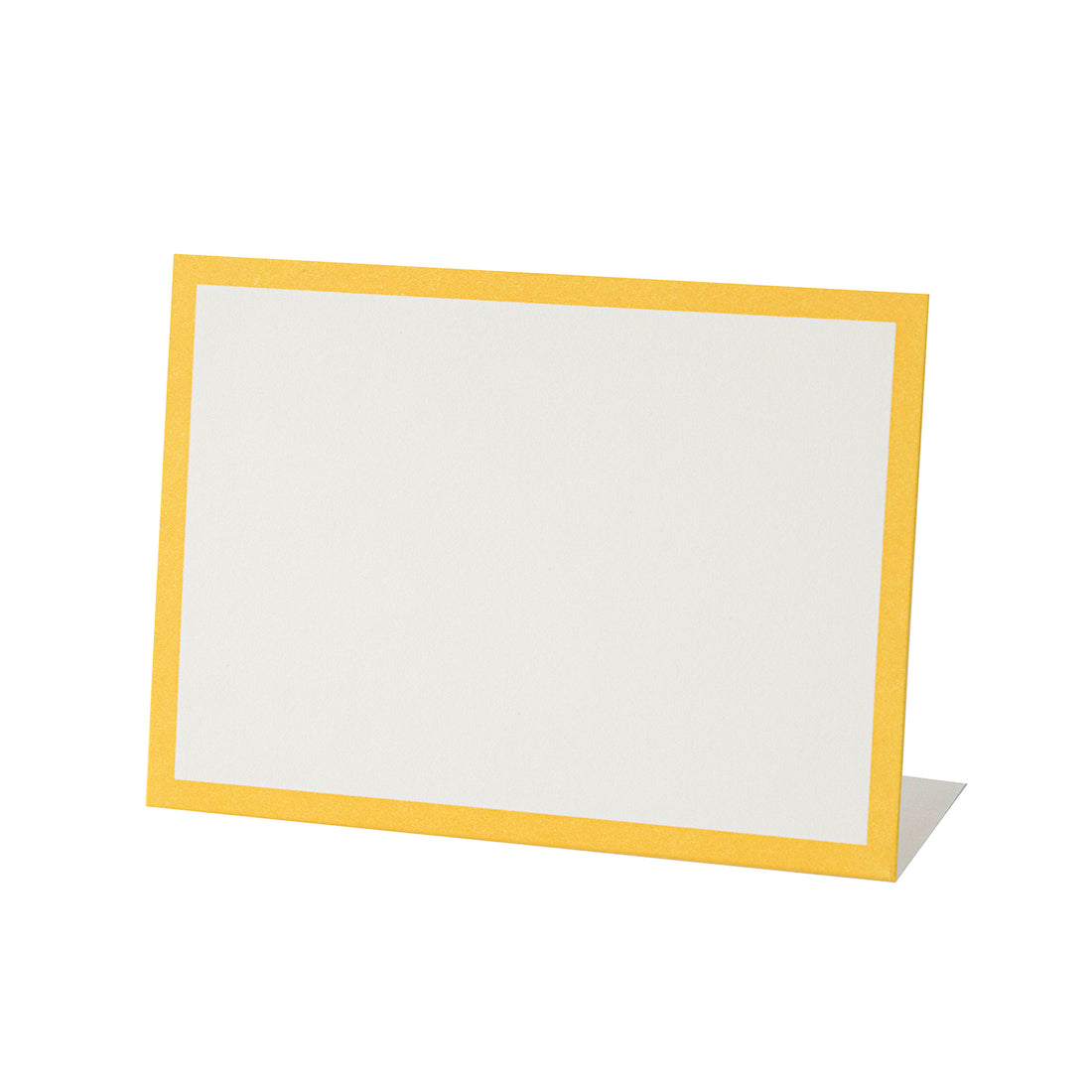 A free-standing, rectangular white table card with a simple golden yellow frame around the edges.