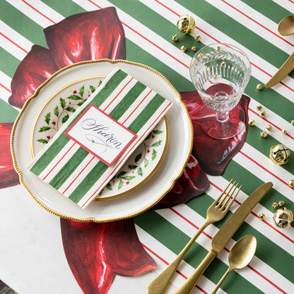 The Die-cut Bow Placemat under an elegant Christmas-themed place setting.