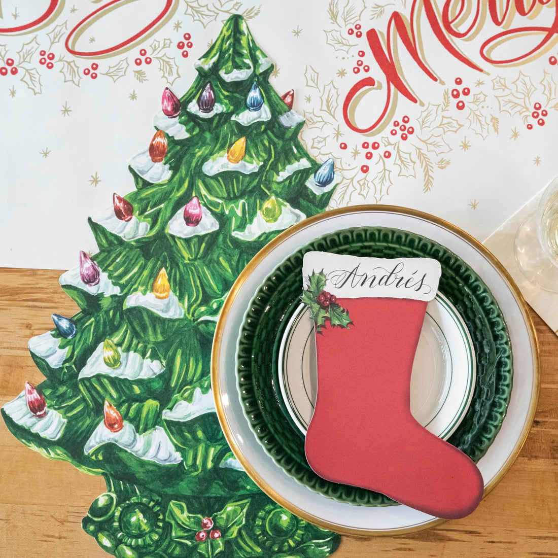 The Die-cut Vintage Christmas Tree Placemat under an elegant holiday place setting, from above.