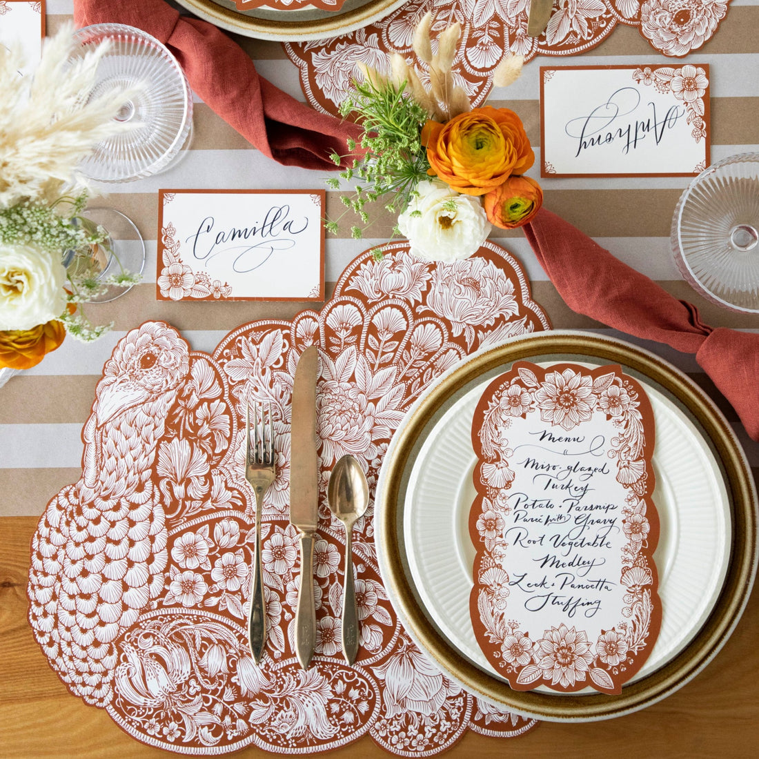 The Die-cut Harvest Turkey Placemat under an elegant Thanksgiving table setting, from above.