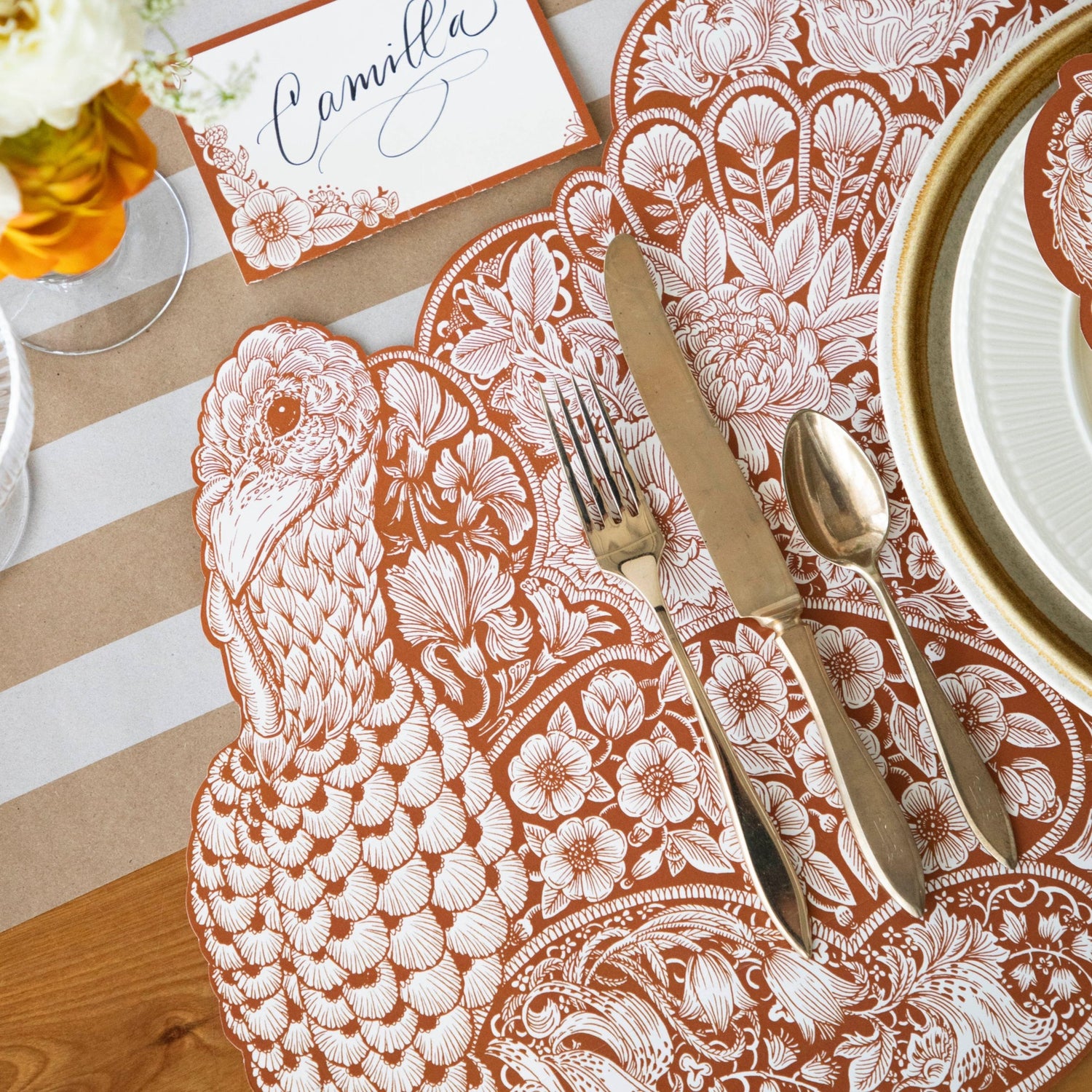 Close-up of the Die-cut Harvest Turkey Placemat under an elegant Thanksgiving place setting, showing the detailed artwork.
