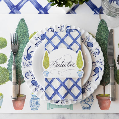 Close-up of the Topiary Garden Placemat in an elegant place setting, from above.