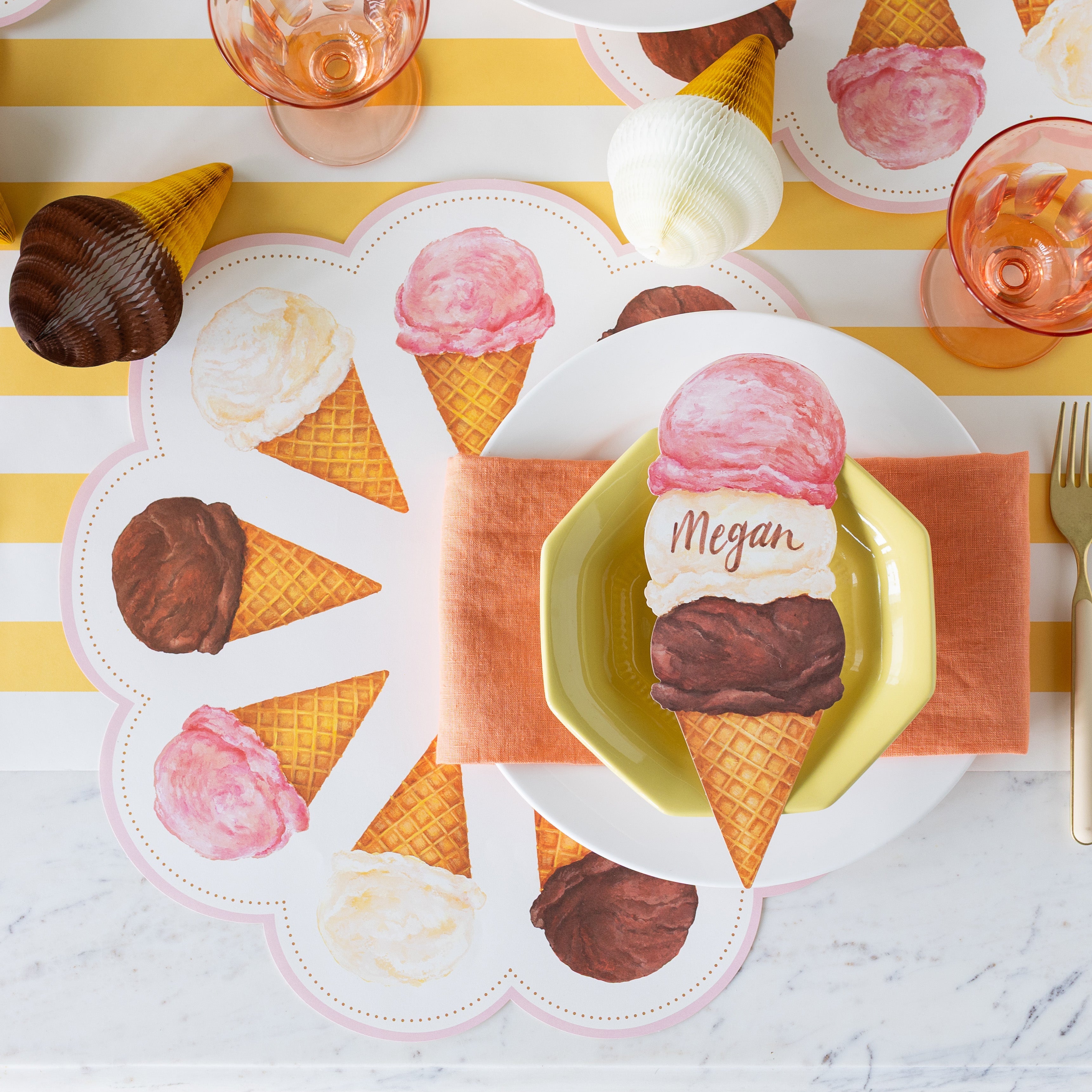 Ice Cream Treat Table Accent with "Megan" written on it, on an ice cream themed place setting.
