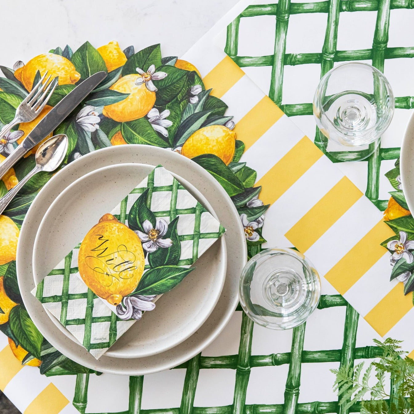 The Die-cut Lemon Wreath under an elegant table setting, at an angle.