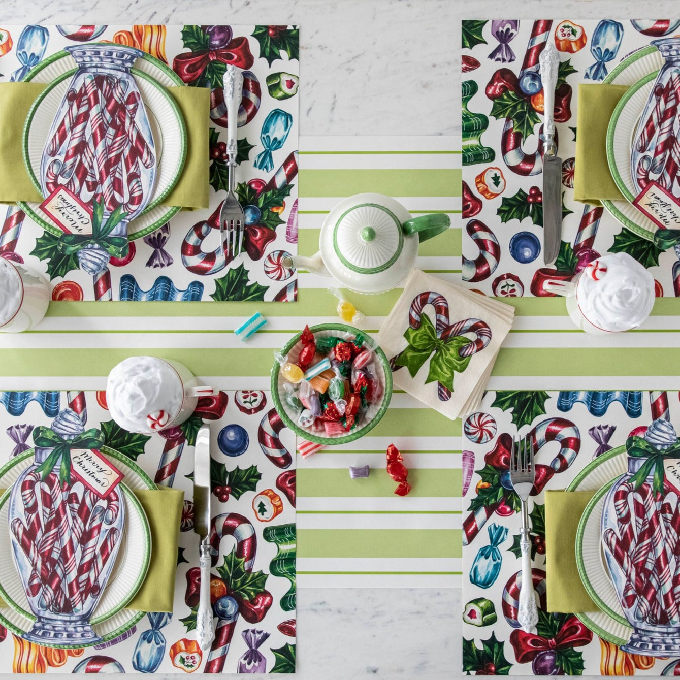 The Candy Cane Shoppe Placemat under a festive Christmas-themed table setting for four.