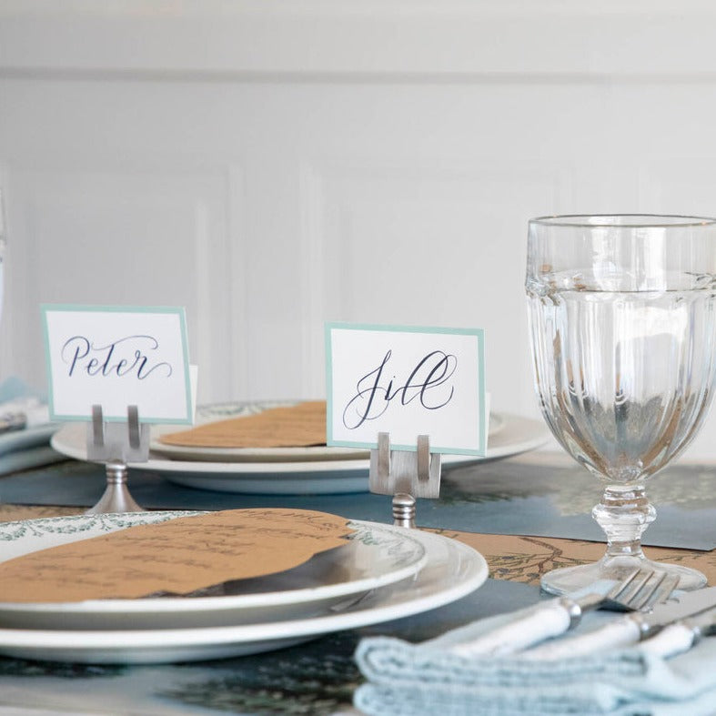 A table setting with Hester &amp; Cook Seafoam Frame Place Cards for guests.