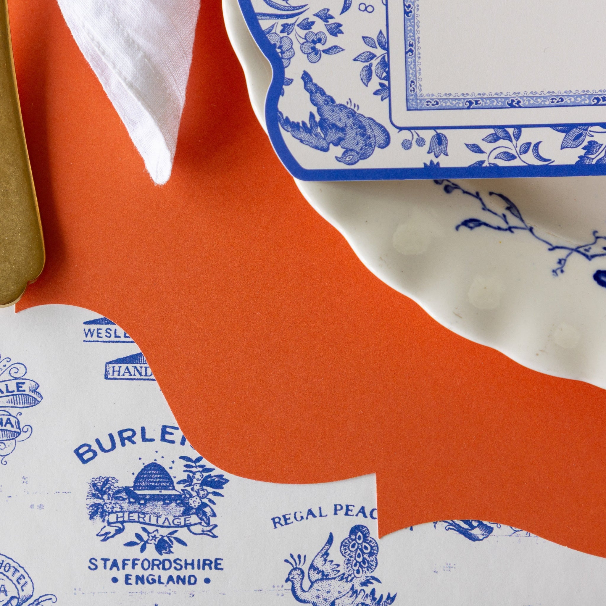 A close of the Die-cut Orange French Frame under a place setting,