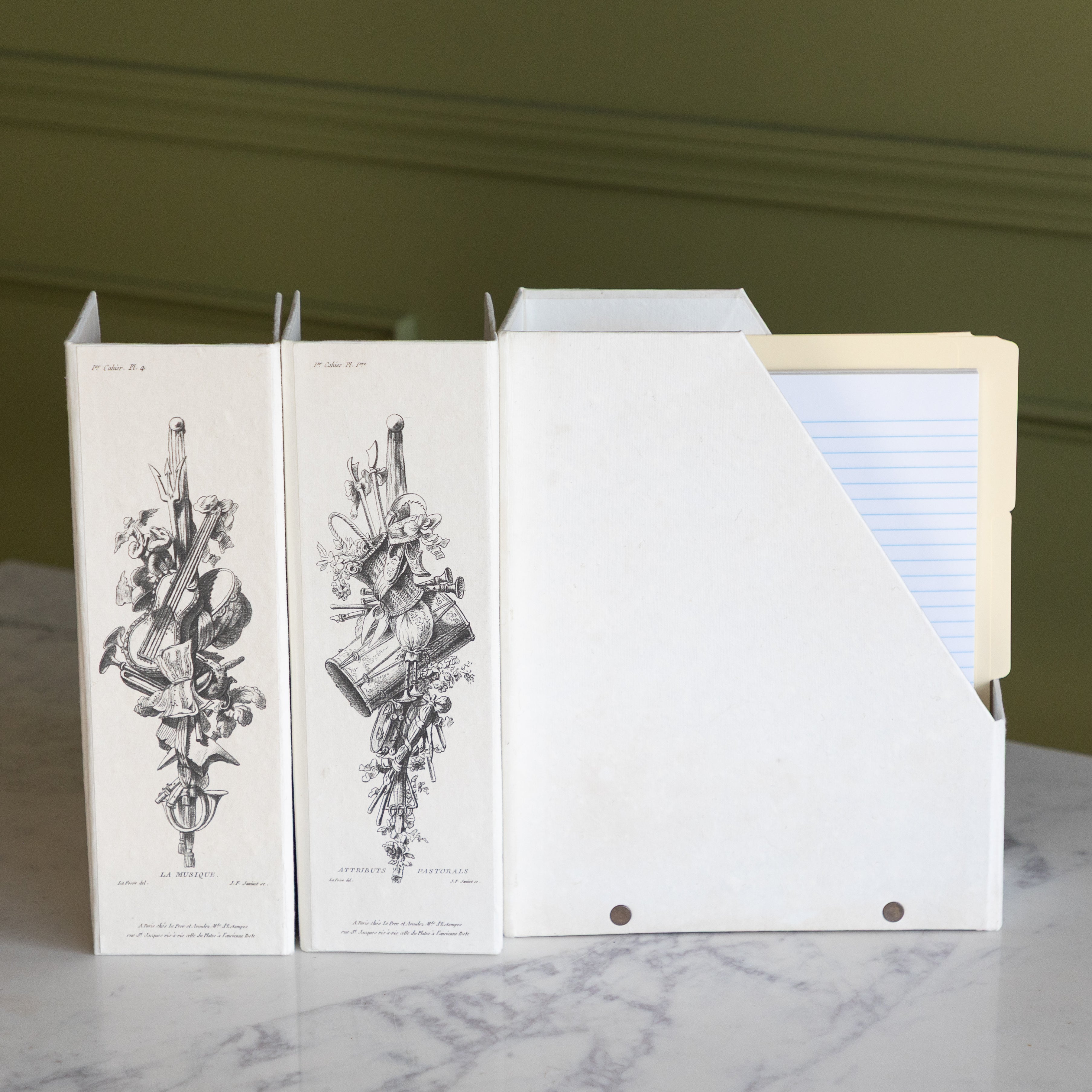 Three "Attributes" Folding Boxes with two facing outwards and one holding files and a notepad.
