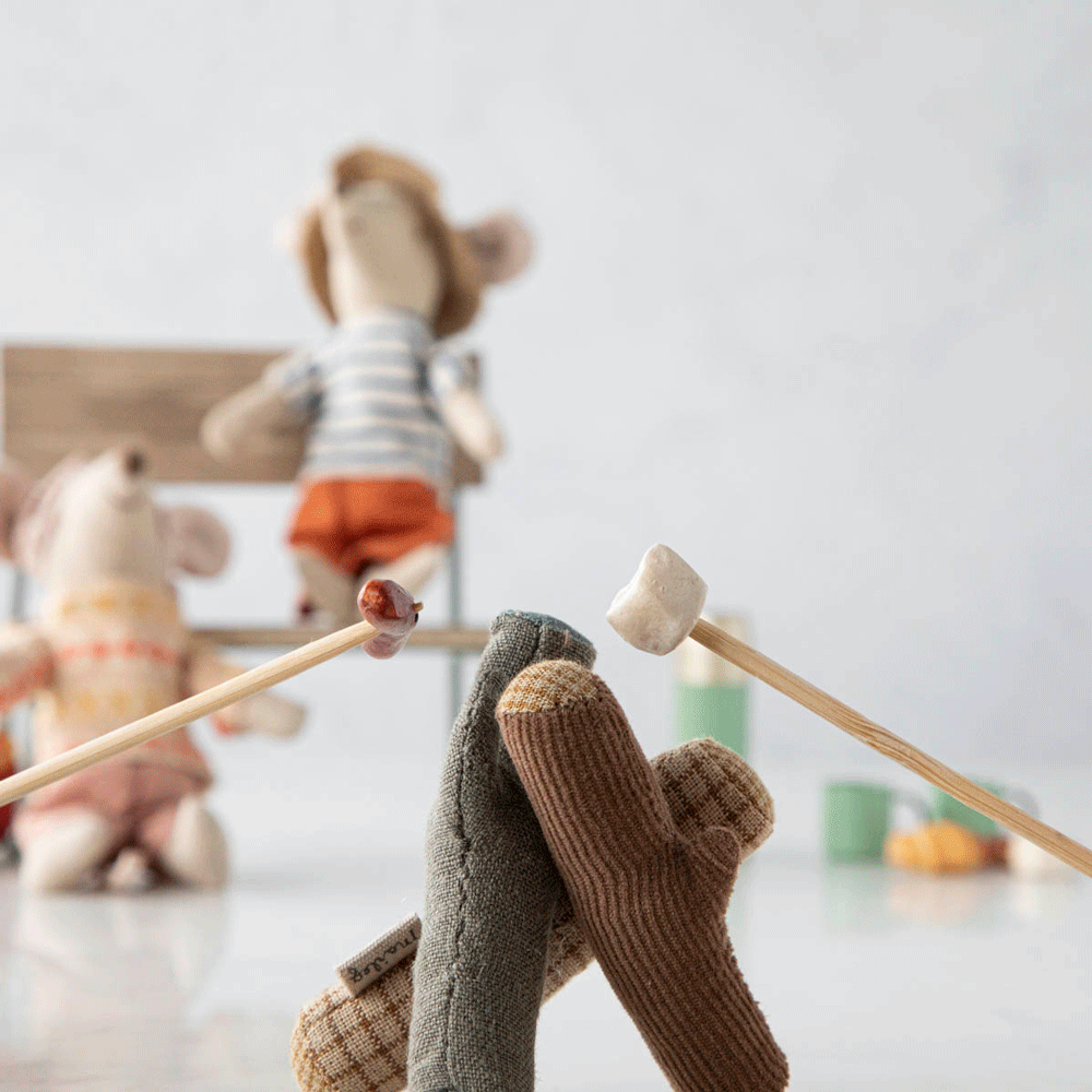 A Maileg Bonfire Set on a stick, perfect for hiker mice.