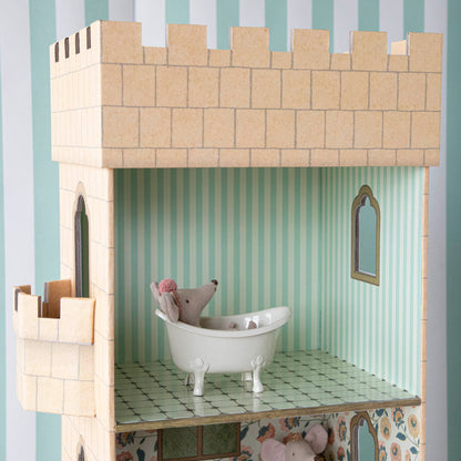 A doll house with a Mouse Bathtub in a vintage bath tub by Maileg.
