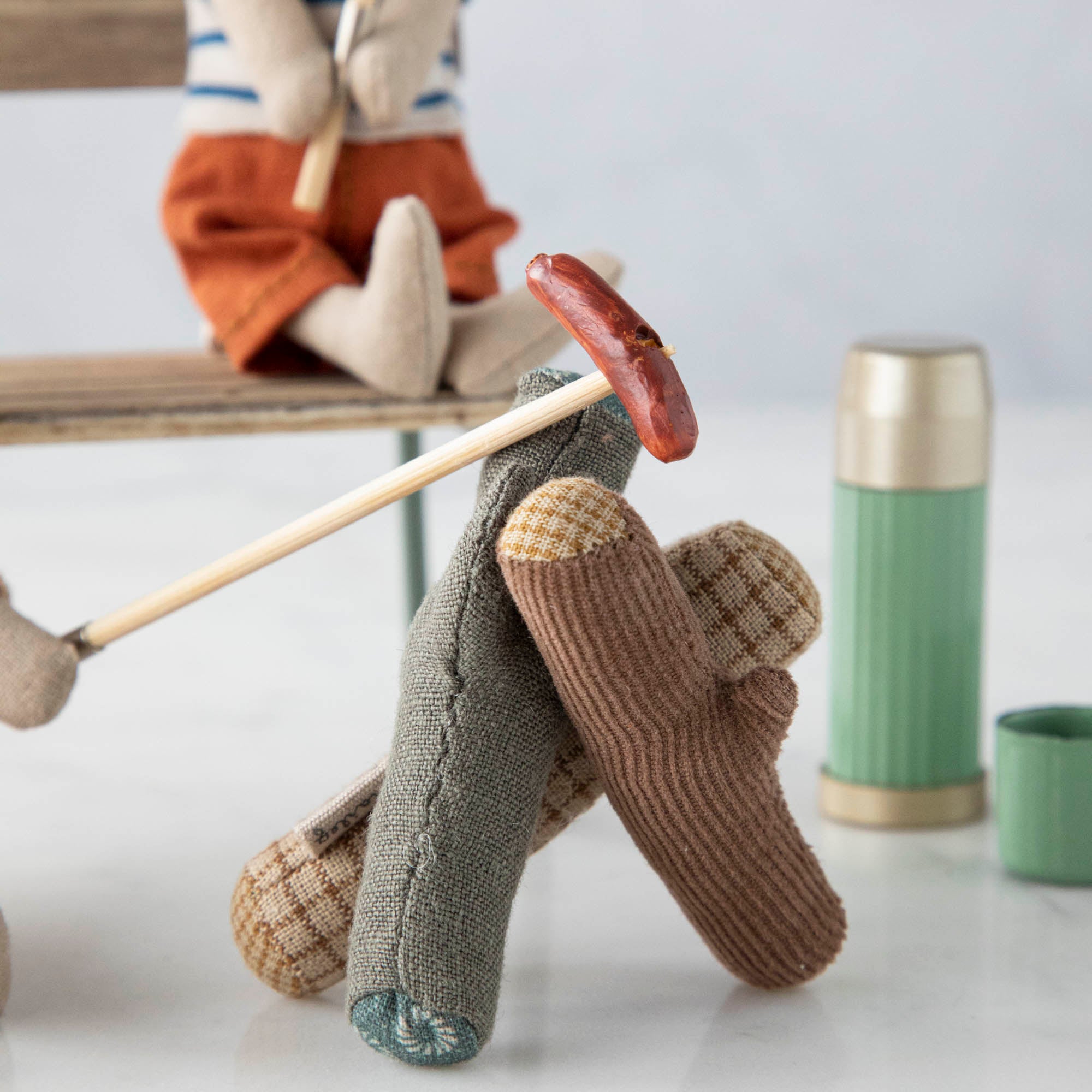 A Maileg Bonfire Set on a stick, perfect for hiker mice.