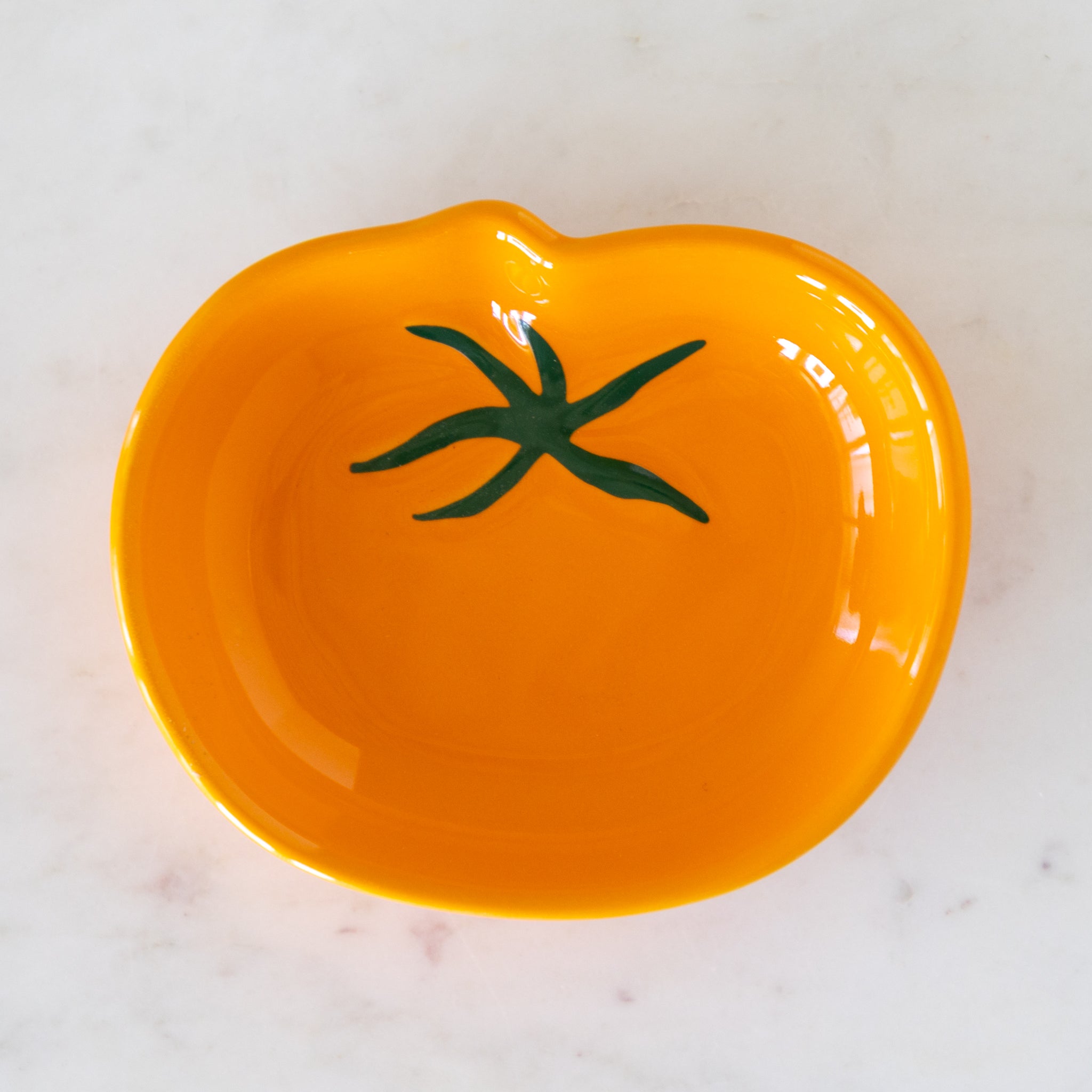 Orange tomato shaped pinch bowl.