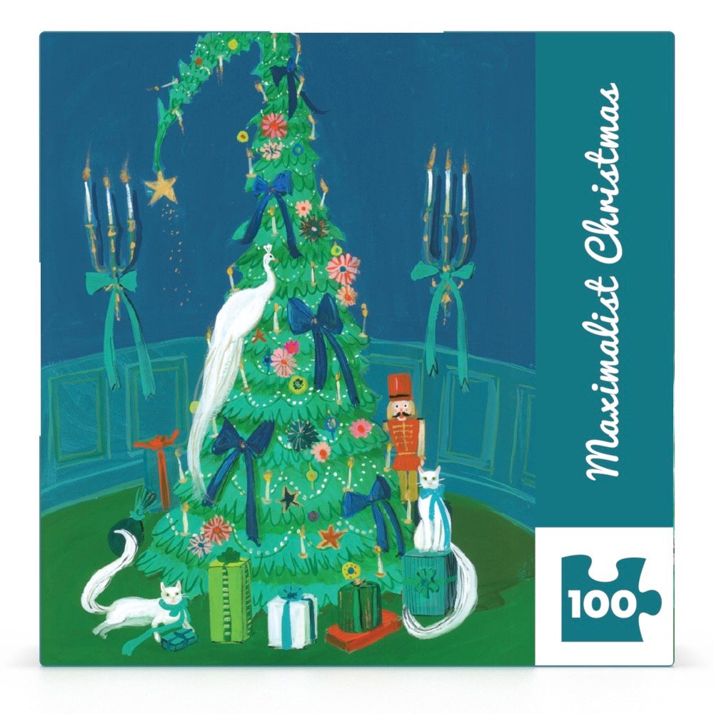 Jigsaw puzzle box with a Christmas tree design featuring animals and decorations on a blue background.