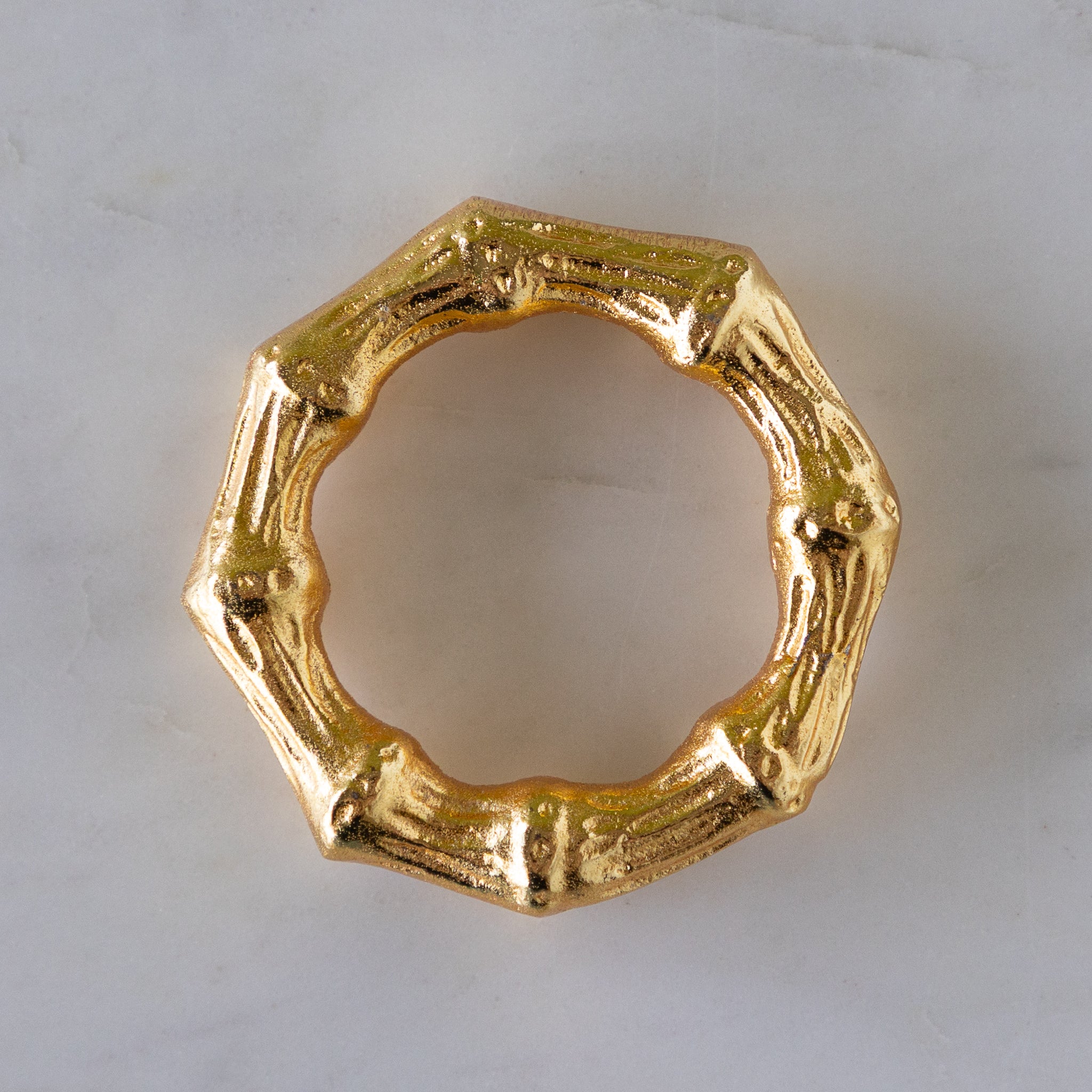 Aluminum Bamboo Napkin Ring on a table.