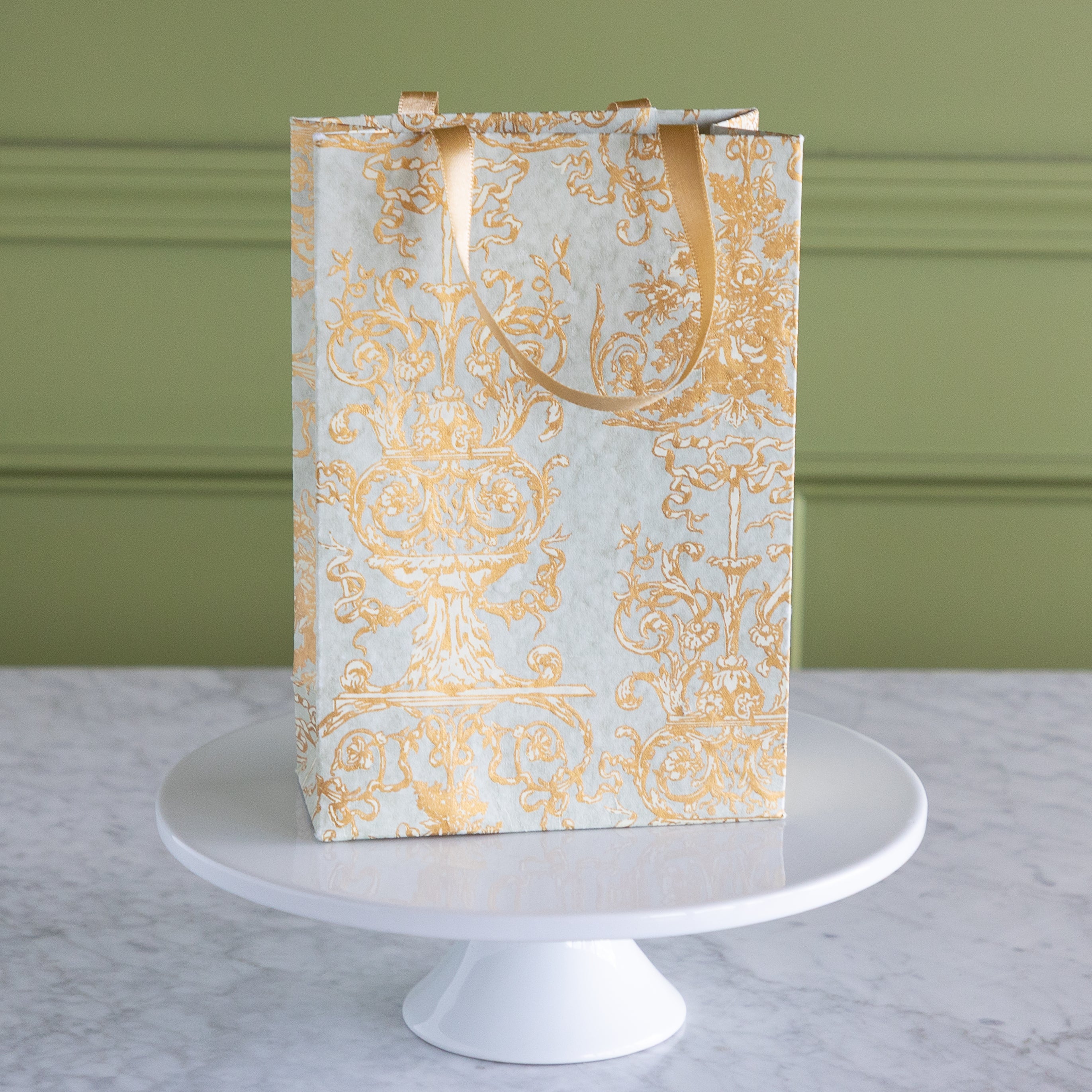 Gilded Scroll Cub Bag