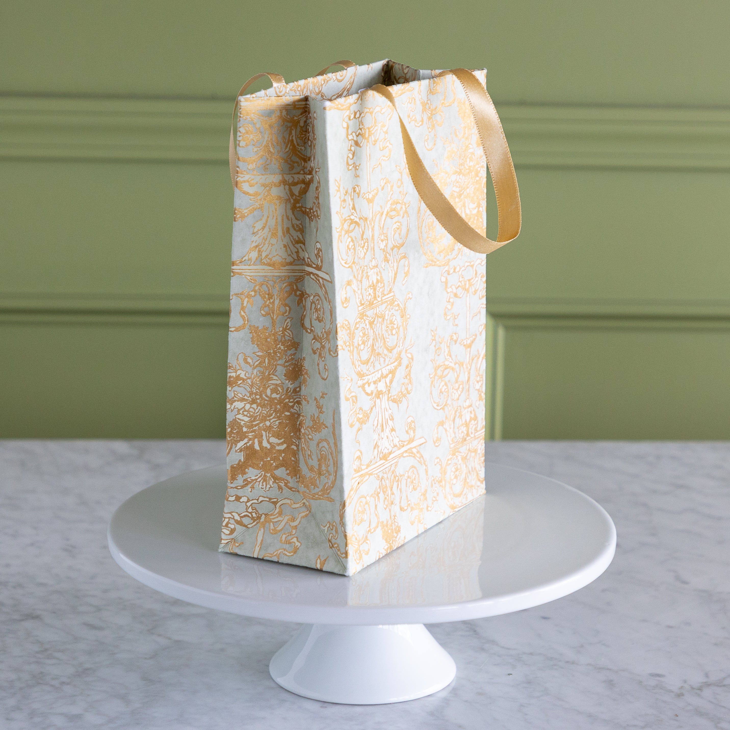 Gilded Scroll Cub Bag