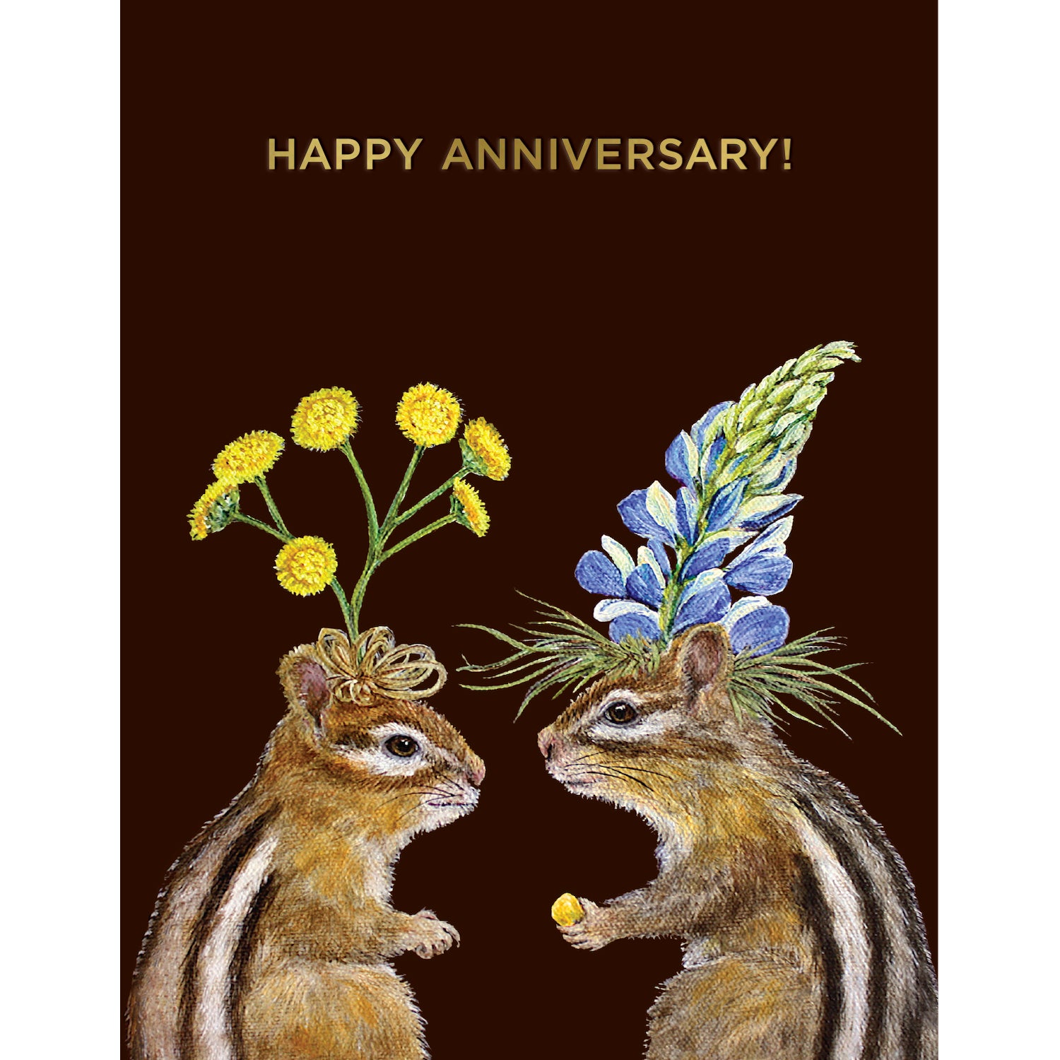 A dark brown greeting card featuring a charming illustration of two chipmunks wearing flower headdresses, with the words "HAPPY ANNIVERSARY!" printed in gold foil.