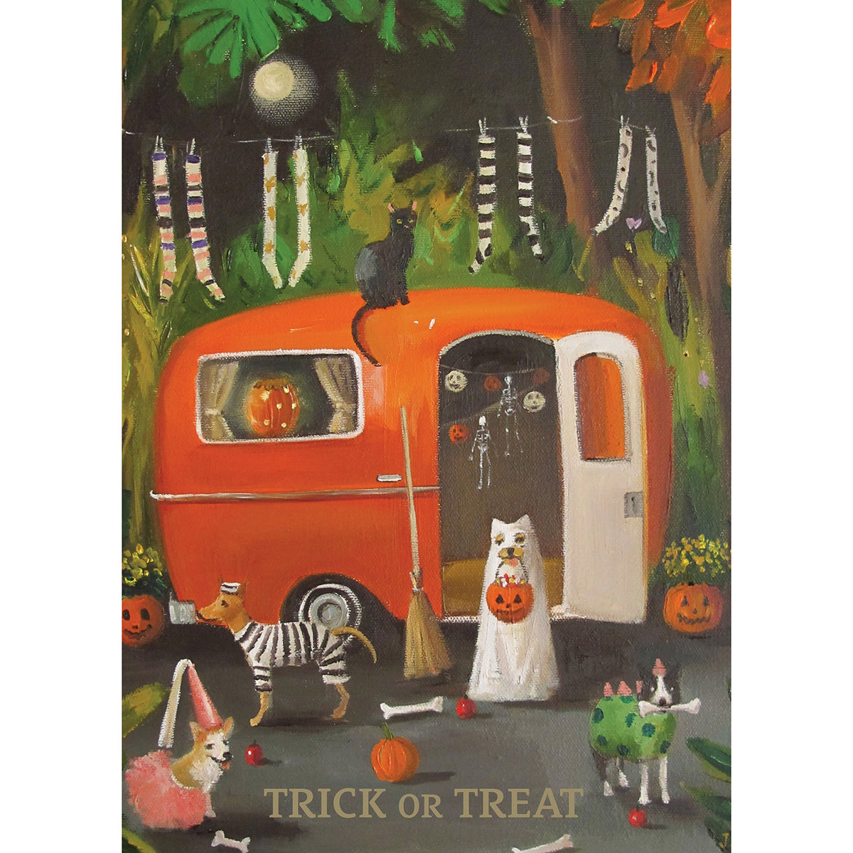 A painterly illustration of a small, orange vintage recreational trailer surrounded by dogs in Halloween costumes and jack-o-lanterns, with a black cat sitting on top. The card reads "TRICK OR TREAT" across the bottom.