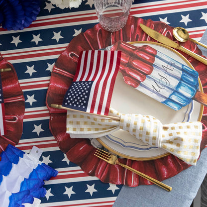 The Die-cut Star-Spangled Placemat under an elegant patriotic place setting.