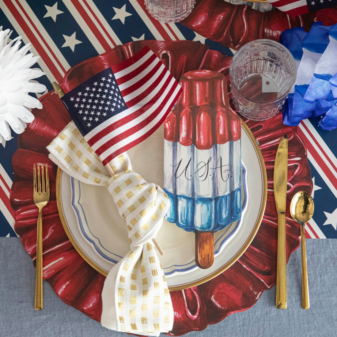 The Die-cut Star-Spangled Placemat under a patriotic table setting, from above.