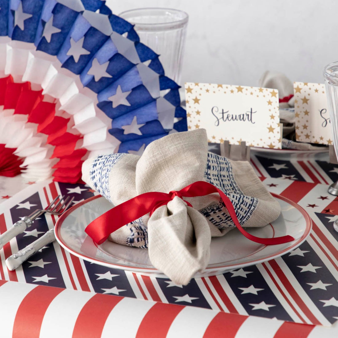 The Stars and Stripes Placemat under a patriotic place setting.