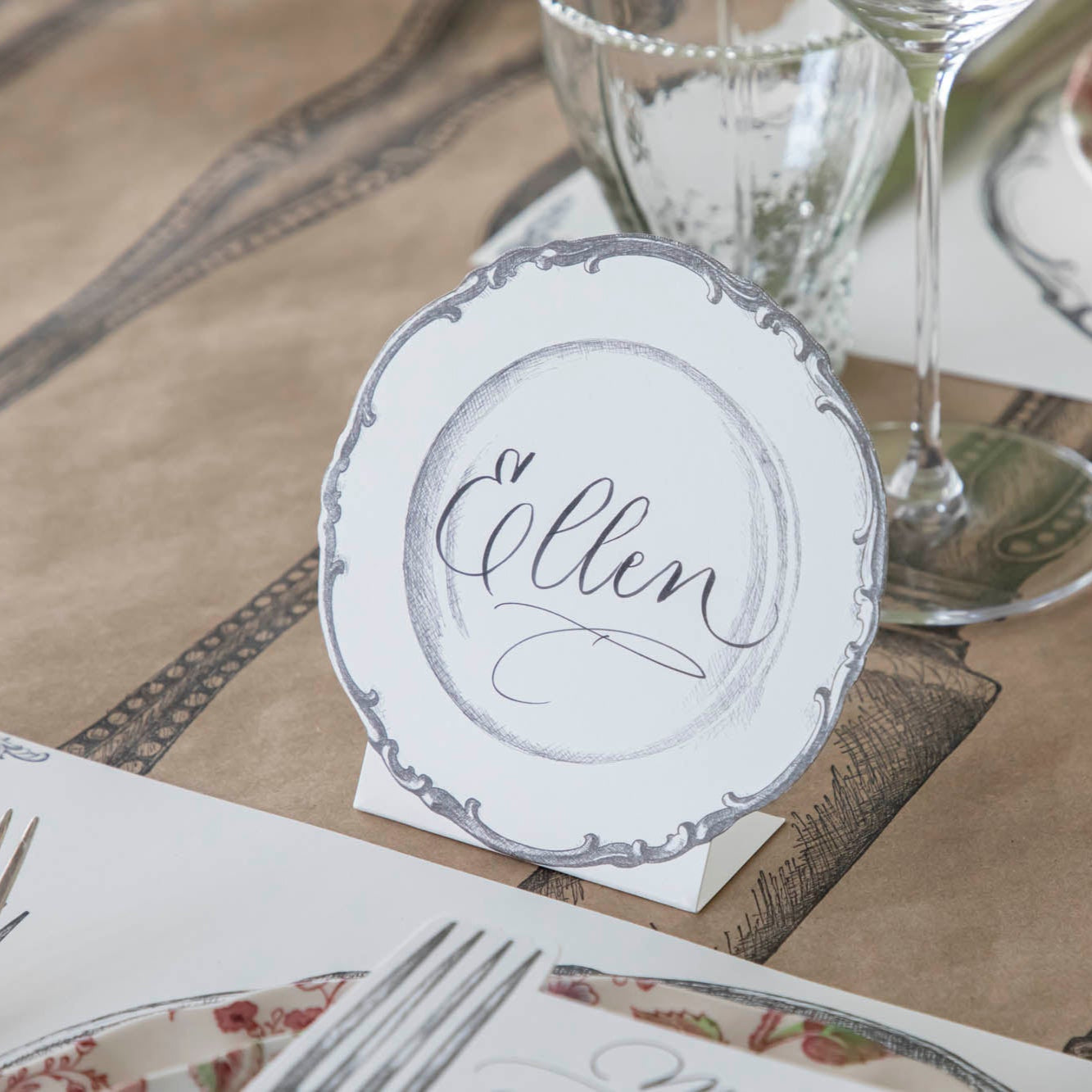 Vintage Plate Place Card with "Ellen" written on it, on the Cutlery on Kraft runner.