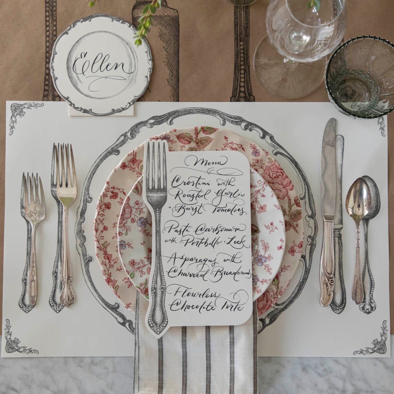 Perfect Setting Placemat styled with vintage silverware and china on top and the Cutlery on Kraft Runner underneath.