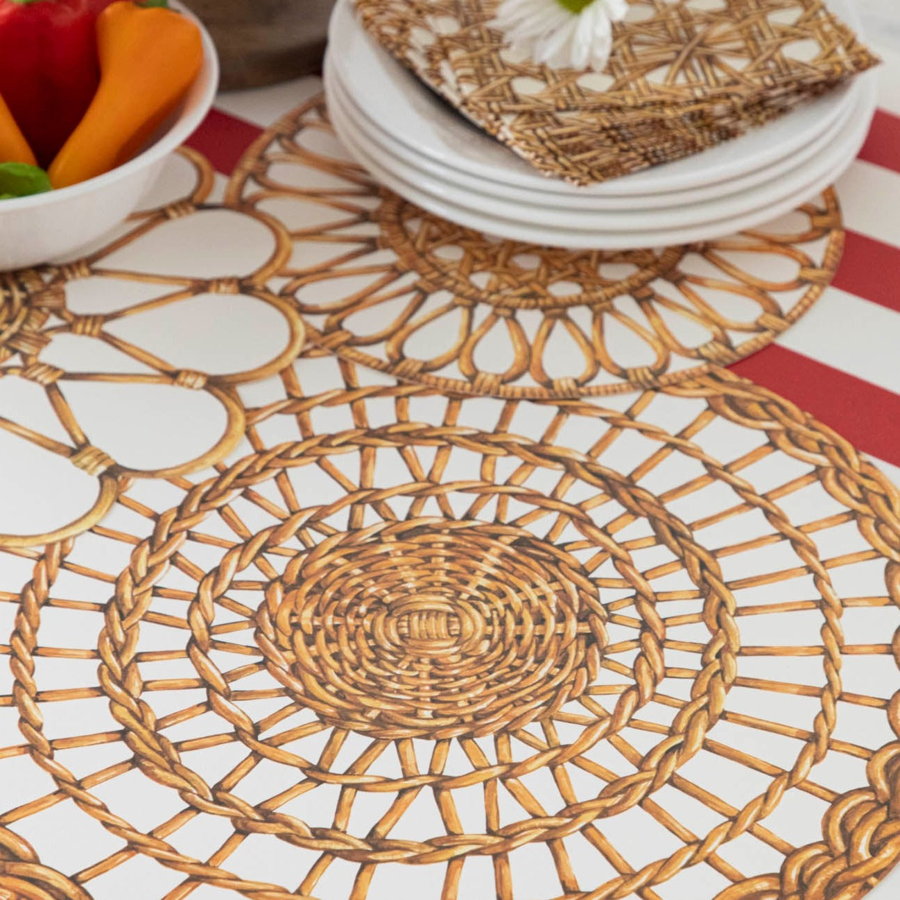A vintage-inspired table adorned with Hester & Cook Rattan Weave Serving Papers.
