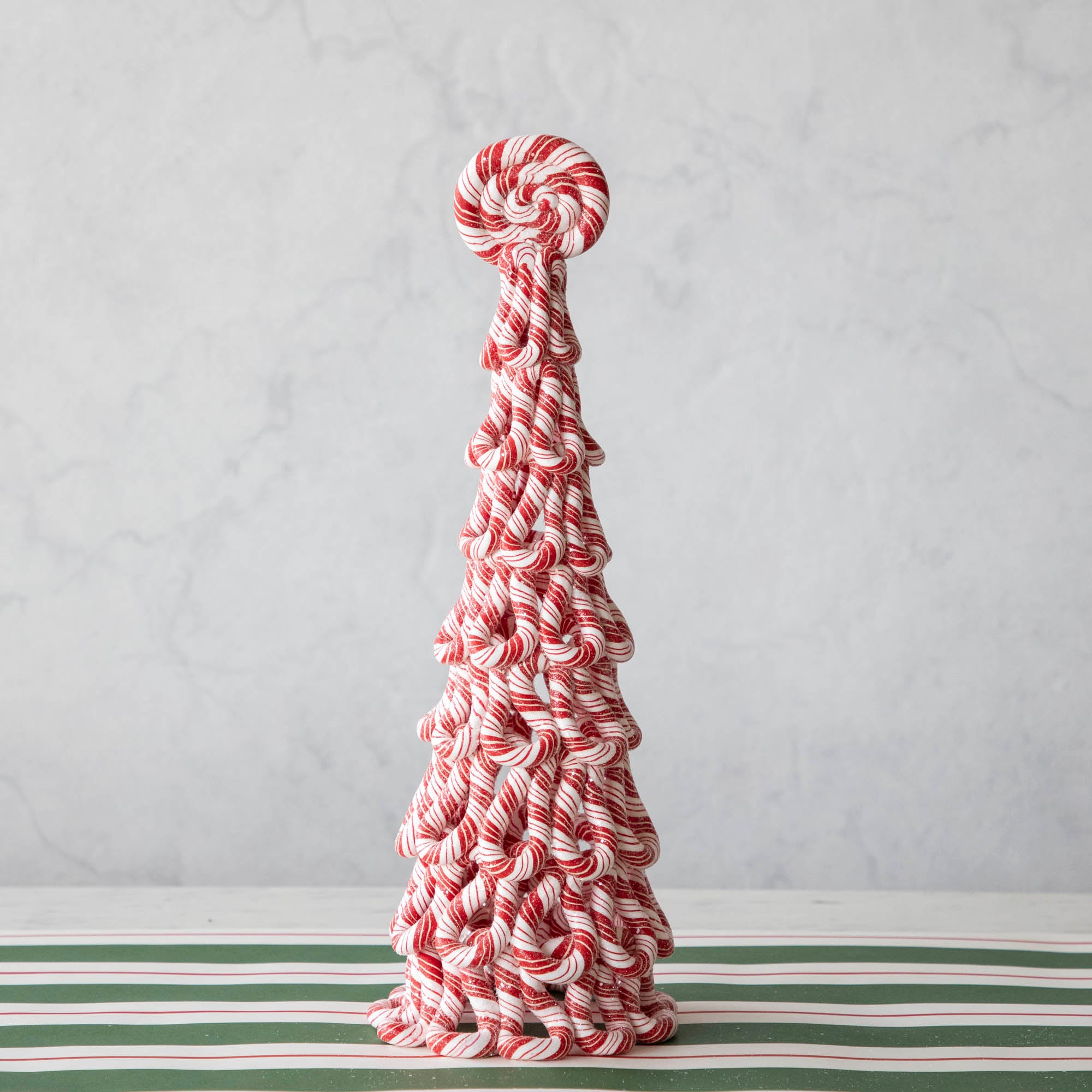 The large peppermint tree on the Green & Red Awning Stripe Runner.