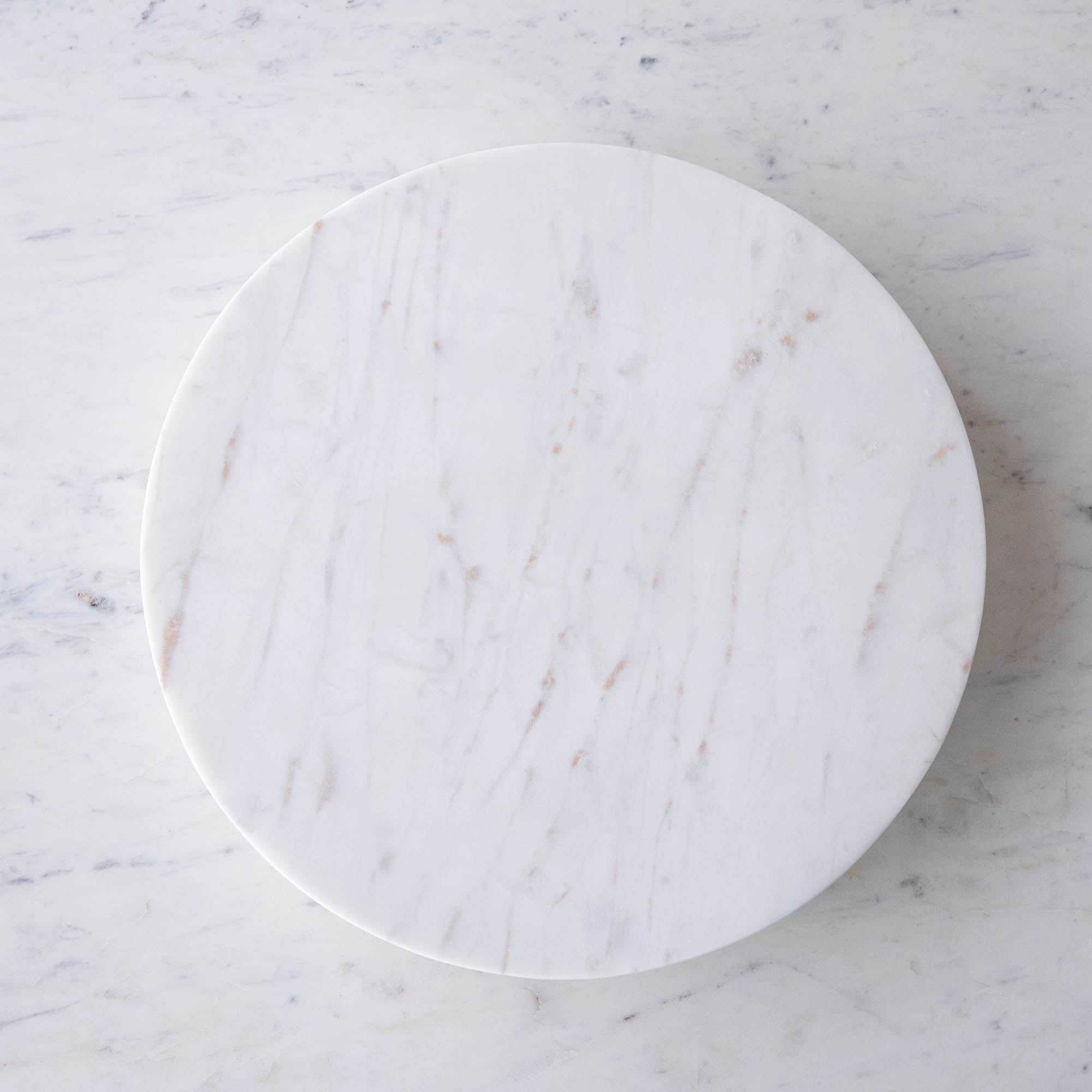 A White Marble Lazy Susan, 15" Diameter with strawberries on it, perfect for your appetizer display.