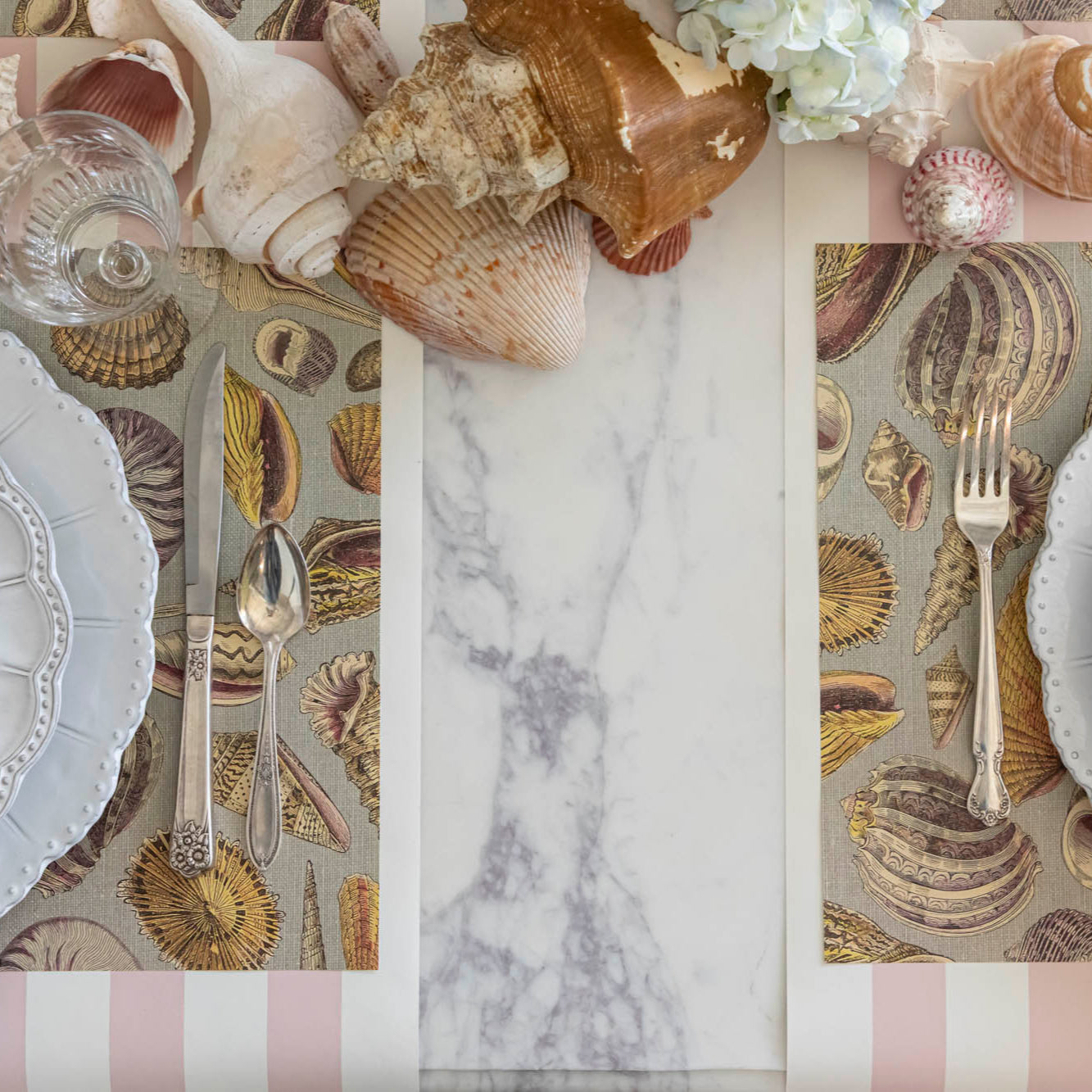 Shell Study Placemat under an elegant place setting on the Pink Classic Stripe Runner.