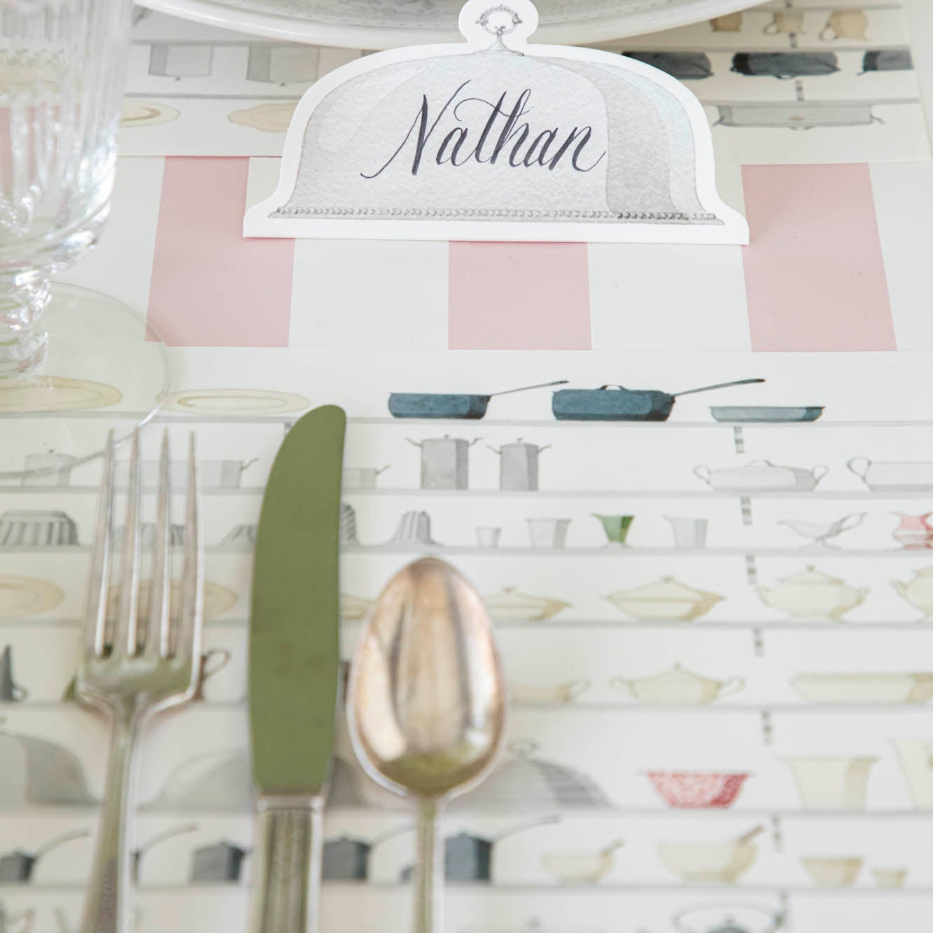 Serving Dome Place Card with "Nathan" written on it, sitting behind the Butler&