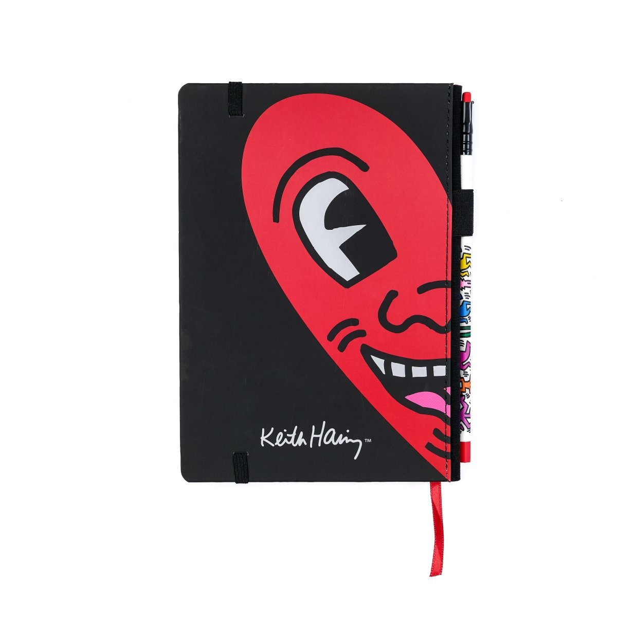 Blackwing notebook featuring artwork by Keith Haring of a half of a heart with a face on it.