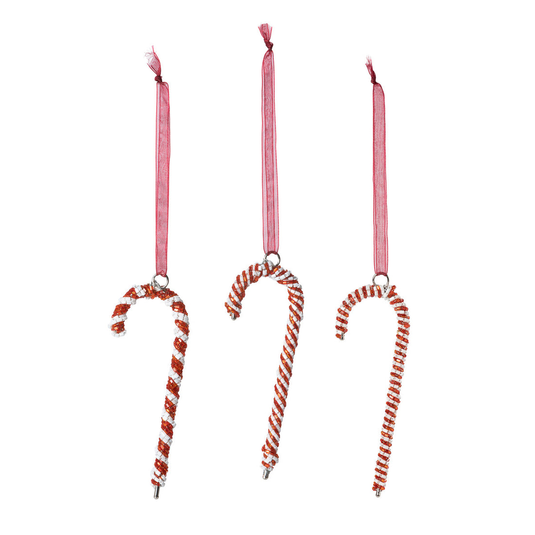 Three Park Hill Beaded Candy Cane Ornaments hanging on a string, adorned with beaded accents.