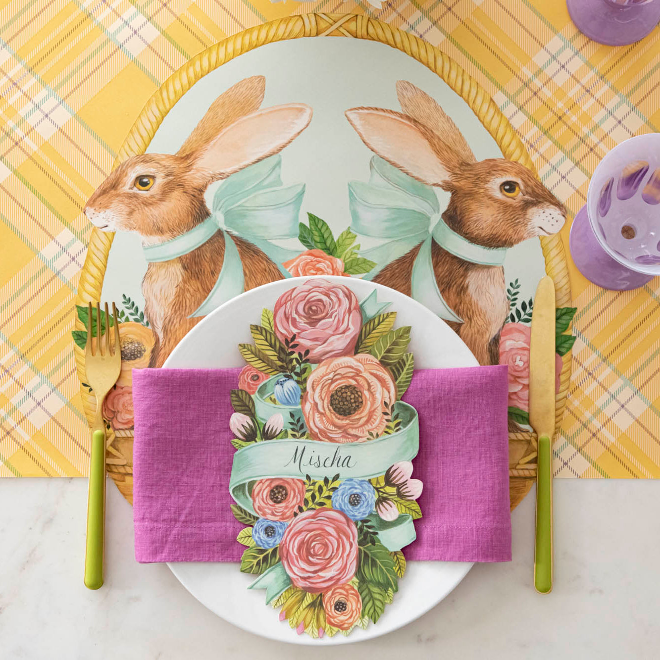 Die-cut Bunny Basket Placemat on the Yellow Plaid Runner, with a spring place setting on top.
