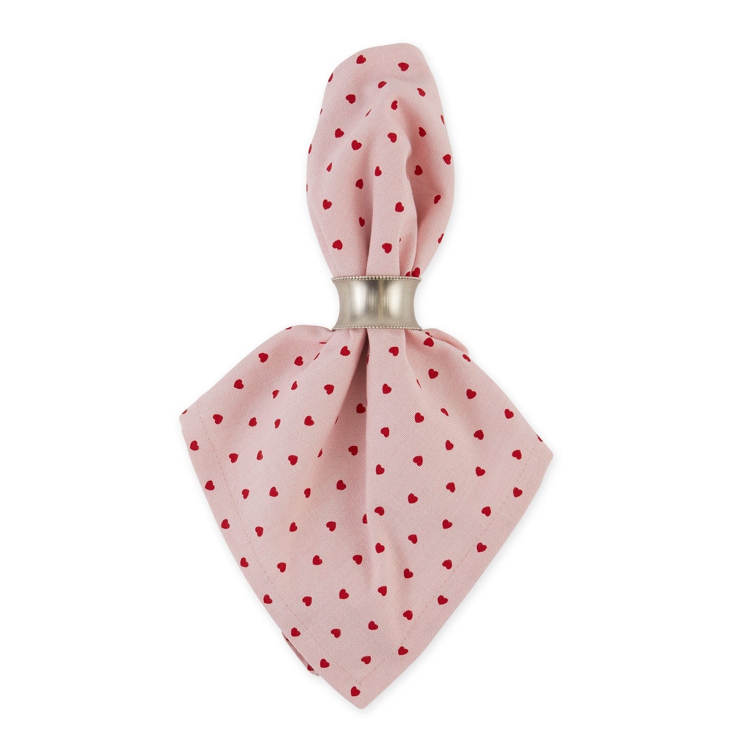A pink cloth napkin with a red heart pattern, neatly folded and tied with a metallic silver band, shown against a plain white background.