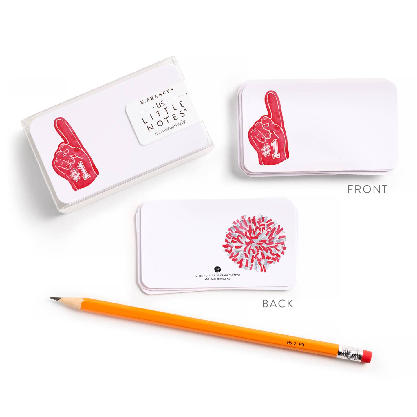 Box of E.Frances Little Notes with a red foam finger on the front and a red and silver pom pom on the back.