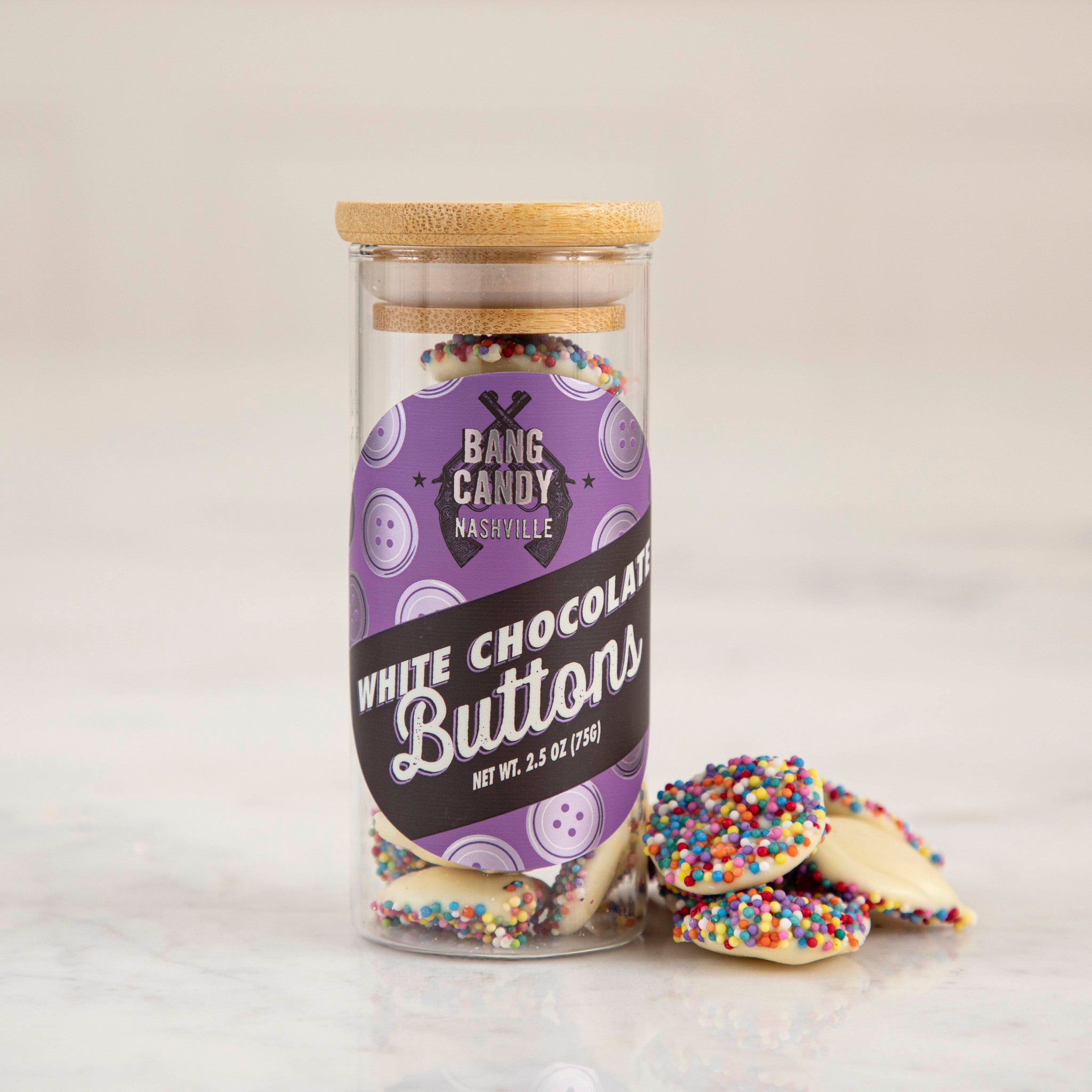 Hester & Cook Chocolate Buttons in a jar with natural nonpareils.