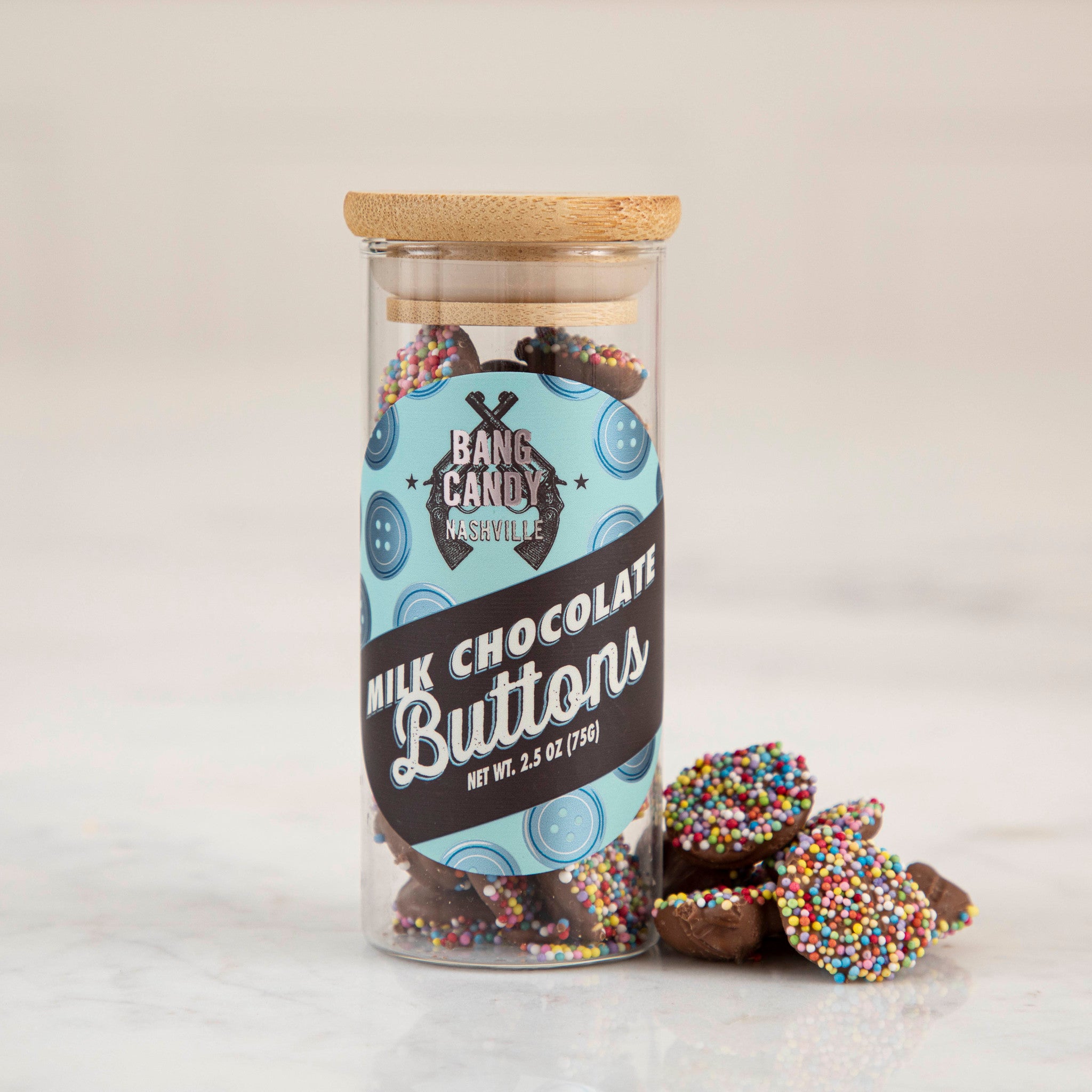 Hester & Cook Chocolate Buttons in a jar with natural nonpareils.