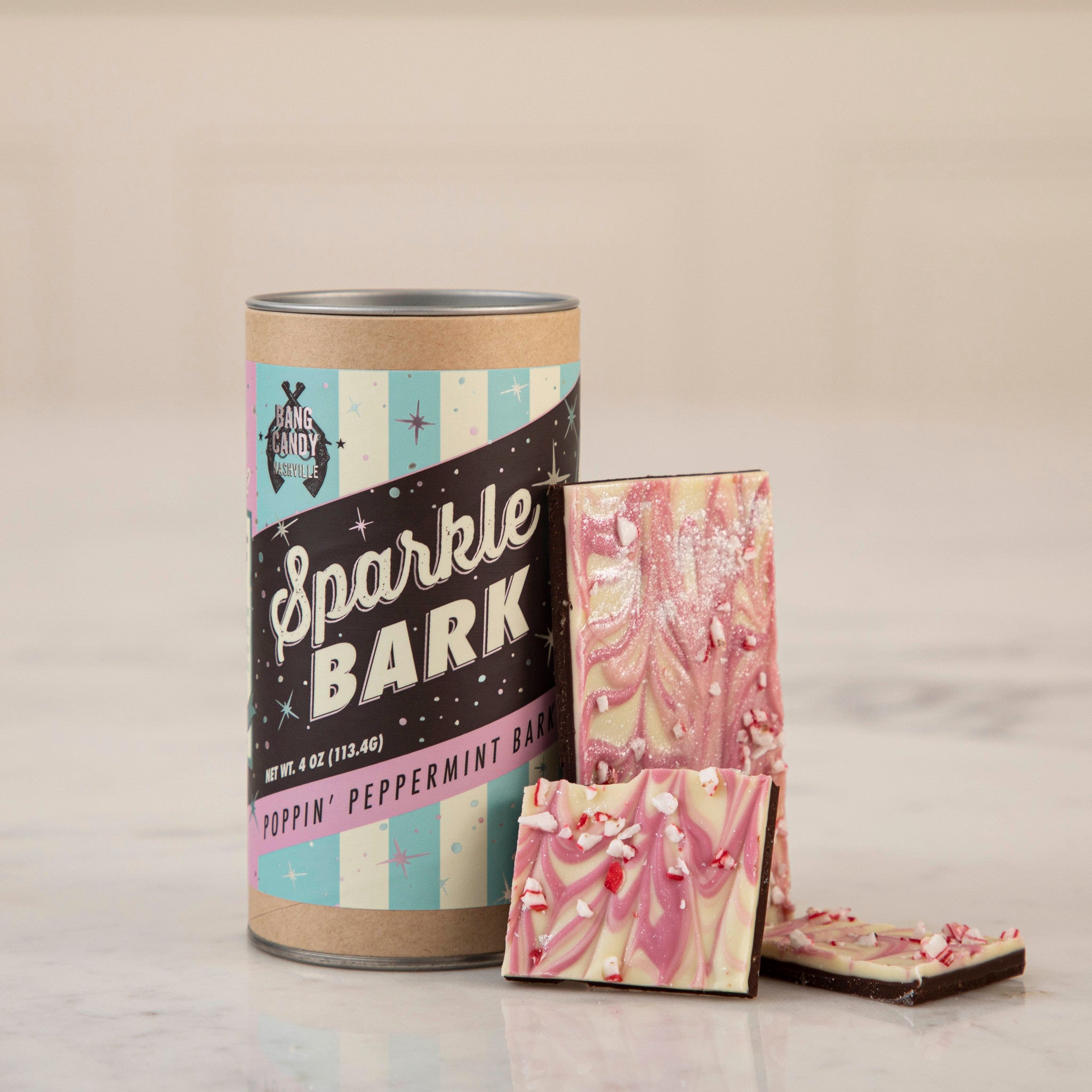 A can of Hester & Cook Sparkle Bark, an all-natural chocolate treat.