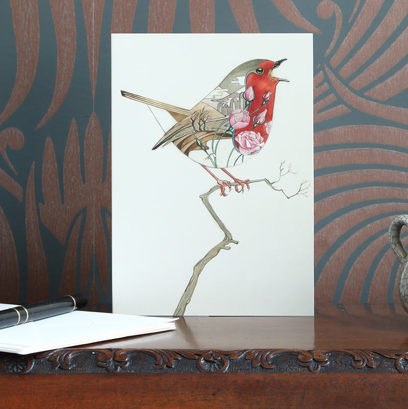 Greeting card featuring artwork by Daniel Mackie of a robin on a twig.