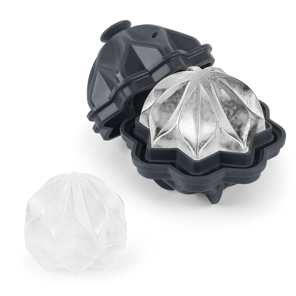 Four assorted Prohibition-era cocktails in elegant glasses, garnished with fruit slices and set on a marble surface with W&P Ice Cube Trays.