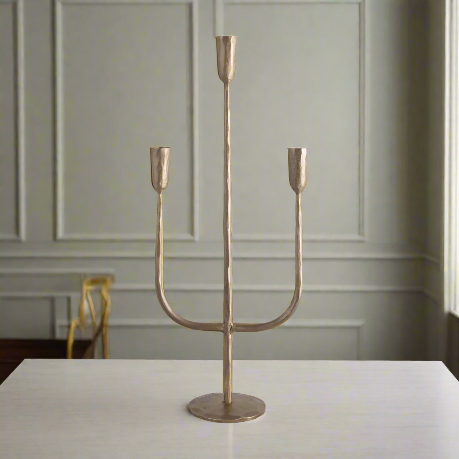 Hand-Forged Metal Candelabra on a table