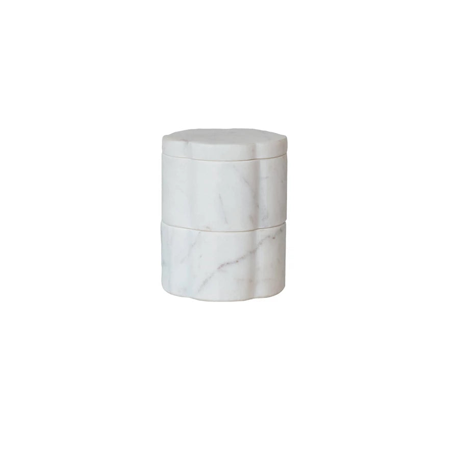 Marble-textured cylindrical container on a white background