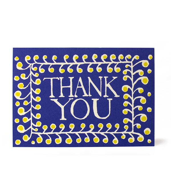 Blue card with a pattern around the edges saying Thank You in the middle.